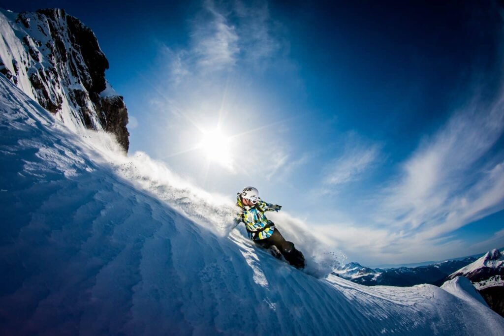 A man snowboarding in the French Alps near Morzine
